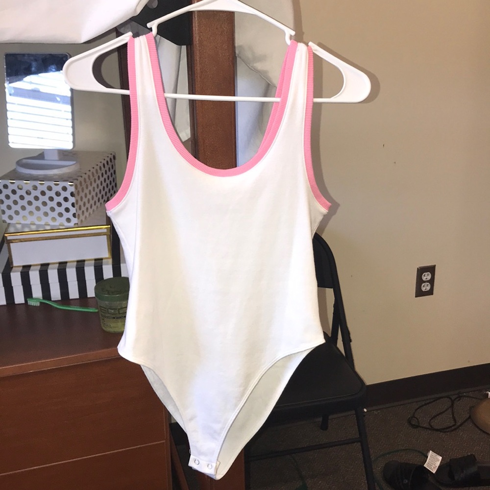 White bodysuit with pink trim